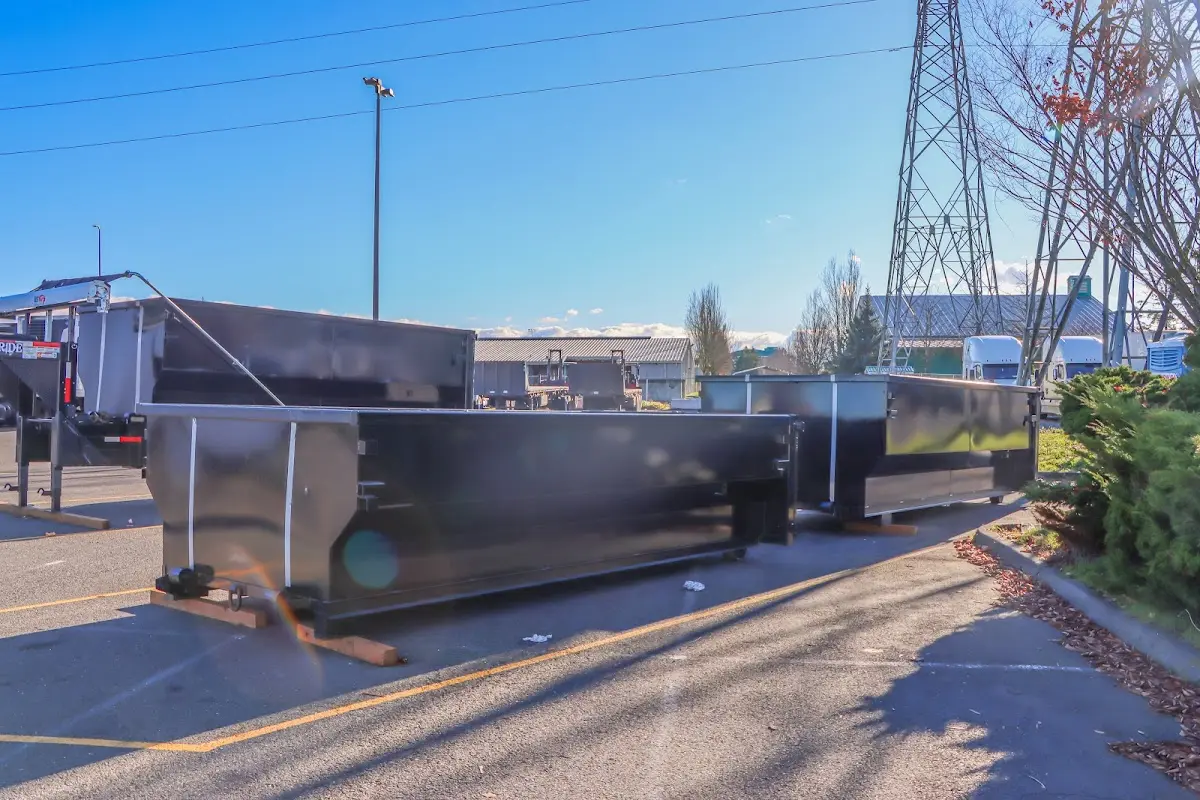 Roll-off dumpster ready for waste disposal at job site for 2 Yard Dumpster Rental in Florida City